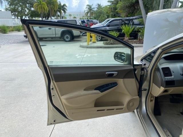 2007 Borrego Beige Metallic /Ivory Honda Civic Sdn LX LOW MILES 24,174 1 OWNER (1HGFA16547L) with an 1.8L SOHC MPFI 16-Valve i-VTEC I4 Engine engine, Automatic transmission, located at 4701 North Dixie Hwy, Pompano Beach, FL, 33064, (954) 422-2889, 26.240938, -80.123474 - OUR WEBPAGE FLORIDACARS1.COM HAS OVER 100 PHOTOS AND FREE CARFAX LINK 2007 Honda Civic LX 1 OWNER Sedan 4 DR 1.8L I4 F SOHC 16V Gasoline Front wheel drive Features ABS Brakes Air Conditioning AM/FM Stereo Automatic Transmission Auxiliary Audio Input CD Audio Cloth Seats Cruise Control Power Locks Po- Photo#9