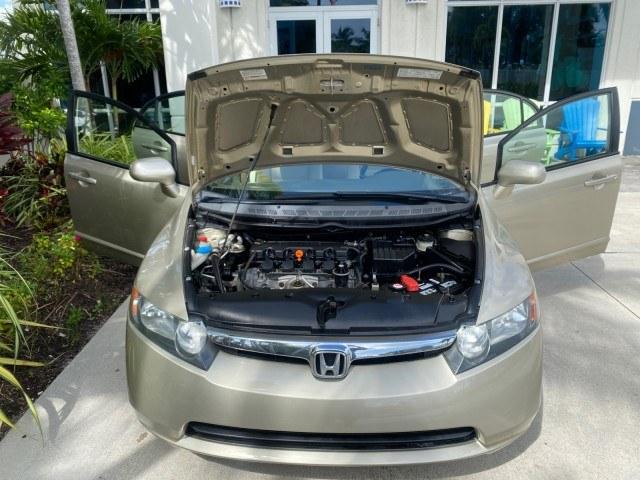 2007 Borrego Beige Metallic /Ivory Honda Civic Sdn LX LOW MILES 24,174 1 OWNER (1HGFA16547L) with an 1.8L SOHC MPFI 16-Valve i-VTEC I4 Engine engine, Automatic transmission, located at 4701 North Dixie Hwy, Pompano Beach, FL, 33064, (954) 422-2889, 26.240938, -80.123474 - OUR WEBPAGE FLORIDACARS1.COM HAS OVER 100 PHOTOS AND FREE CARFAX LINK 2007 Honda Civic LX 1 OWNER Sedan 4 DR 1.8L I4 F SOHC 16V Gasoline Front wheel drive Features ABS Brakes Air Conditioning AM/FM Stereo Automatic Transmission Auxiliary Audio Input CD Audio Cloth Seats Cruise Control Power Locks Po- Photo#17