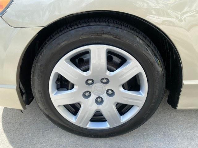2007 Borrego Beige Metallic /Ivory Honda Civic Sdn LX LOW MILES 24,174 1 OWNER (1HGFA16547L) with an 1.8L SOHC MPFI 16-Valve i-VTEC I4 Engine engine, Automatic transmission, located at 4701 North Dixie Hwy, Pompano Beach, FL, 33064, (954) 422-2889, 26.240938, -80.123474 - OUR WEBPAGE FLORIDACARS1.COM HAS OVER 100 PHOTOS AND FREE CARFAX LINK 2007 Honda Civic LX 1 OWNER Sedan 4 DR 1.8L I4 F SOHC 16V Gasoline Front wheel drive Features ABS Brakes Air Conditioning AM/FM Stereo Automatic Transmission Auxiliary Audio Input CD Audio Cloth Seats Cruise Control Power Locks Po- Photo#19
