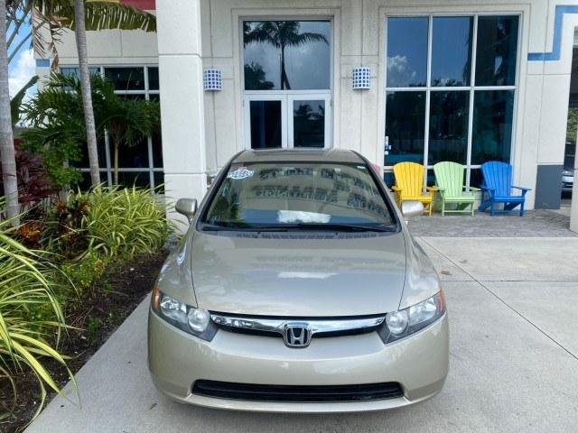 2007 Borrego Beige Metallic /Ivory Honda Civic Sdn LX LOW MILES 24,174 1 OWNER (1HGFA16547L) with an 1.8L SOHC MPFI 16-Valve i-VTEC I4 Engine engine, Automatic transmission, located at 4701 North Dixie Hwy, Pompano Beach, FL, 33064, (954) 422-2889, 26.240938, -80.123474 - OUR WEBPAGE FLORIDACARS1.COM HAS OVER 100 PHOTOS AND FREE CARFAX LINK 2007 Honda Civic LX 1 OWNER Sedan 4 DR 1.8L I4 F SOHC 16V Gasoline Front wheel drive Features ABS Brakes Air Conditioning AM/FM Stereo Automatic Transmission Auxiliary Audio Input CD Audio Cloth Seats Cruise Control Power Locks Po- Photo#26