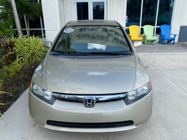 2007 Borrego Beige Metallic /Ivory Honda Civic Sdn LX LOW MILES 24,174 1 OWNER (1HGFA16547L) with an 1.8L SOHC MPFI 16-Valve i-VTEC I4 Engine engine, Automatic transmission, located at 4701 North Dixie Hwy, Pompano Beach, FL, 33064, (954) 422-2889, 26.240938, -80.123474 - OUR WEBPAGE FLORIDACARS1.COM HAS OVER 100 PHOTOS AND FREE CARFAX LINK 2007 Honda Civic LX 1 OWNER Sedan 4 DR 1.8L I4 F SOHC 16V Gasoline Front wheel drive Features ABS Brakes Air Conditioning AM/FM Stereo Automatic Transmission Auxiliary Audio Input CD Audio Cloth Seats Cruise Control Power Locks Po- Photo#27