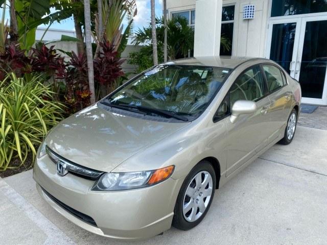 2007 Borrego Beige Metallic /Ivory Honda Civic Sdn LX LOW MILES 24,174 1 OWNER (1HGFA16547L) with an 1.8L SOHC MPFI 16-Valve i-VTEC I4 Engine engine, Automatic transmission, located at 4701 North Dixie Hwy, Pompano Beach, FL, 33064, (954) 422-2889, 26.240938, -80.123474 - OUR WEBPAGE FLORIDACARS1.COM HAS OVER 100 PHOTOS AND FREE CARFAX LINK 2007 Honda Civic LX 1 OWNER Sedan 4 DR 1.8L I4 F SOHC 16V Gasoline Front wheel drive Features ABS Brakes Air Conditioning AM/FM Stereo Automatic Transmission Auxiliary Audio Input CD Audio Cloth Seats Cruise Control Power Locks Po- Photo#29