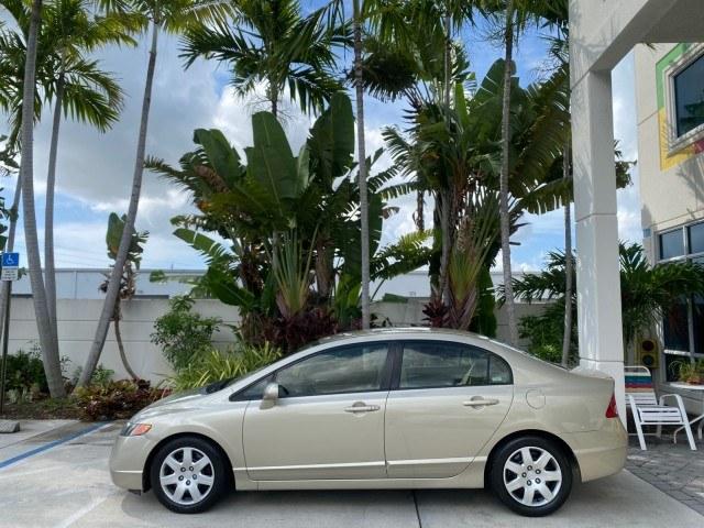 2007 Borrego Beige Metallic /Ivory Honda Civic Sdn LX LOW MILES 24,174 1 OWNER (1HGFA16547L) with an 1.8L SOHC MPFI 16-Valve i-VTEC I4 Engine engine, Automatic transmission, located at 4701 North Dixie Hwy, Pompano Beach, FL, 33064, (954) 422-2889, 26.240938, -80.123474 - OUR WEBPAGE FLORIDACARS1.COM HAS OVER 100 PHOTOS AND FREE CARFAX LINK 2007 Honda Civic LX 1 OWNER Sedan 4 DR 1.8L I4 F SOHC 16V Gasoline Front wheel drive Features ABS Brakes Air Conditioning AM/FM Stereo Automatic Transmission Auxiliary Audio Input CD Audio Cloth Seats Cruise Control Power Locks Po- Photo#30