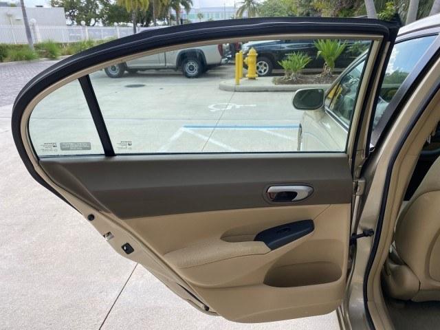 2007 Borrego Beige Metallic /Ivory Honda Civic Sdn LX LOW MILES 24,174 1 OWNER (1HGFA16547L) with an 1.8L SOHC MPFI 16-Valve i-VTEC I4 Engine engine, Automatic transmission, located at 4701 North Dixie Hwy, Pompano Beach, FL, 33064, (954) 422-2889, 26.240938, -80.123474 - OUR WEBPAGE FLORIDACARS1.COM HAS OVER 100 PHOTOS AND FREE CARFAX LINK 2007 Honda Civic LX 1 OWNER Sedan 4 DR 1.8L I4 F SOHC 16V Gasoline Front wheel drive Features ABS Brakes Air Conditioning AM/FM Stereo Automatic Transmission Auxiliary Audio Input CD Audio Cloth Seats Cruise Control Power Locks Po- Photo#76