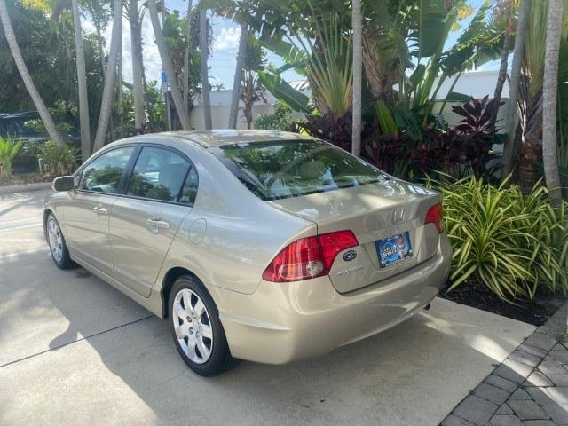 2007 Borrego Beige Metallic /Ivory Honda Civic Sdn LX LOW MILES 24,174 1 OWNER (1HGFA16547L) with an 1.8L SOHC MPFI 16-Valve i-VTEC I4 Engine engine, Automatic transmission, located at 4701 North Dixie Hwy, Pompano Beach, FL, 33064, (954) 422-2889, 26.240938, -80.123474 - OUR WEBPAGE FLORIDACARS1.COM HAS OVER 100 PHOTOS AND FREE CARFAX LINK 2007 Honda Civic LX 1 OWNER Sedan 4 DR 1.8L I4 F SOHC 16V Gasoline Front wheel drive Features ABS Brakes Air Conditioning AM/FM Stereo Automatic Transmission Auxiliary Audio Input CD Audio Cloth Seats Cruise Control Power Locks Po- Photo#5