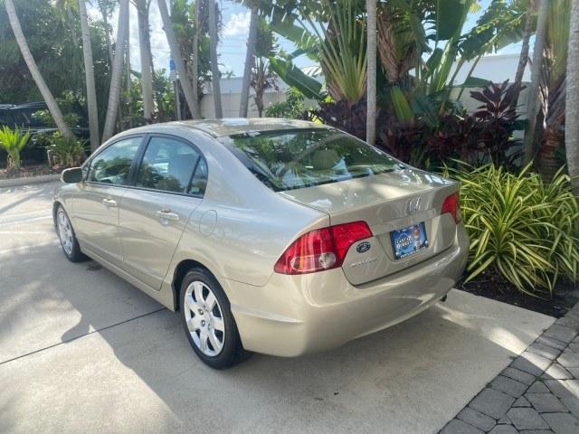 2007 Borrego Beige Metallic /Ivory Honda Civic Sdn LX LOW MILES 24,174 1 OWNER (1HGFA16547L) with an 1.8L SOHC MPFI 16-Valve i-VTEC I4 Engine engine, Automatic transmission, located at 4701 North Dixie Hwy, Pompano Beach, FL, 33064, (954) 422-2889, 26.240938, -80.123474 - OUR WEBPAGE FLORIDACARS1.COM HAS OVER 100 PHOTOS AND FREE CARFAX LINK 2007 Honda Civic LX 1 OWNER Sedan 4 DR 1.8L I4 F SOHC 16V Gasoline Front wheel drive Features ABS Brakes Air Conditioning AM/FM Stereo Automatic Transmission Auxiliary Audio Input CD Audio Cloth Seats Cruise Control Power Locks Po- Photo#32