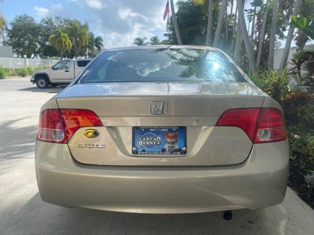 2007 Borrego Beige Metallic /Ivory Honda Civic Sdn LX LOW MILES 24,174 1 OWNER (1HGFA16547L) with an 1.8L SOHC MPFI 16-Valve i-VTEC I4 Engine engine, Automatic transmission, located at 4701 North Dixie Hwy, Pompano Beach, FL, 33064, (954) 422-2889, 26.240938, -80.123474 - OUR WEBPAGE FLORIDACARS1.COM HAS OVER 100 PHOTOS AND FREE CARFAX LINK 2007 Honda Civic LX 1 OWNER Sedan 4 DR 1.8L I4 F SOHC 16V Gasoline Front wheel drive Features ABS Brakes Air Conditioning AM/FM Stereo Automatic Transmission Auxiliary Audio Input CD Audio Cloth Seats Cruise Control Power Locks Po- Photo#91