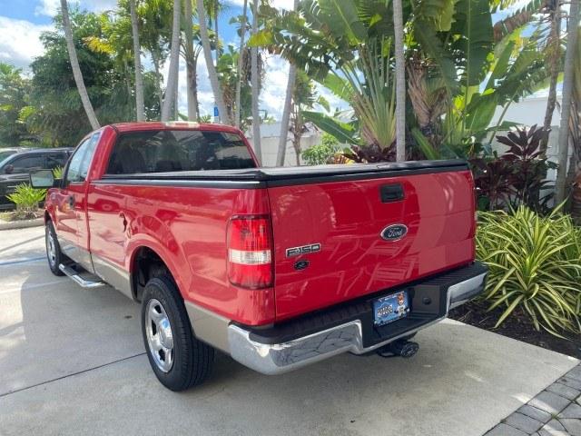2005 Bright Red /Tan Ford F-150 XLT LOW MILES 78,118 (1FTRF12W25N) with an 4.6L EFI V8 Engine engine, Automatic transmission, located at 4701 North Dixie Hwy, Pompano Beach, FL, 33064, (954) 422-2889, 26.240938, -80.123474 - OUR WEBPAGE FLORIDACARS1.COM HAS OVER 100 PHOTOS AND FREE CARFAX LINK 2005 Ford F-150 XLT Pickup 4.6L V8 F SOHC Gasoline 19 MPG Rear Wheel Drive Features ABS Brakes Air Conditioning AM/FM Stereo Automatic Transmission Bed Cover Bed Liner CD Audio Cloth Seats Cruise Control Long Bed Power Locks Power- Photo#5