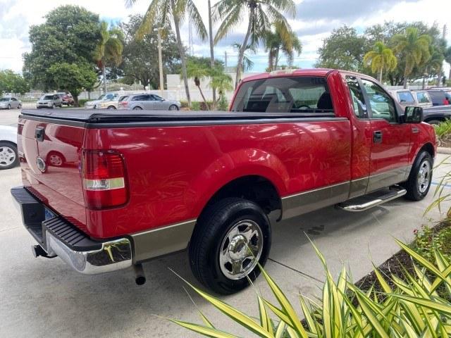 2005 Bright Red /Tan Ford F-150 XLT LOW MILES 78,118 (1FTRF12W25N) with an 4.6L EFI V8 Engine engine, Automatic transmission, located at 4701 North Dixie Hwy, Pompano Beach, FL, 33064, (954) 422-2889, 26.240938, -80.123474 - OUR WEBPAGE FLORIDACARS1.COM HAS OVER 100 PHOTOS AND FREE CARFAX LINK 2005 Ford F-150 XLT Pickup 4.6L V8 F SOHC Gasoline 19 MPG Rear Wheel Drive Features ABS Brakes Air Conditioning AM/FM Stereo Automatic Transmission Bed Cover Bed Liner CD Audio Cloth Seats Cruise Control Long Bed Power Locks Power- Photo#7