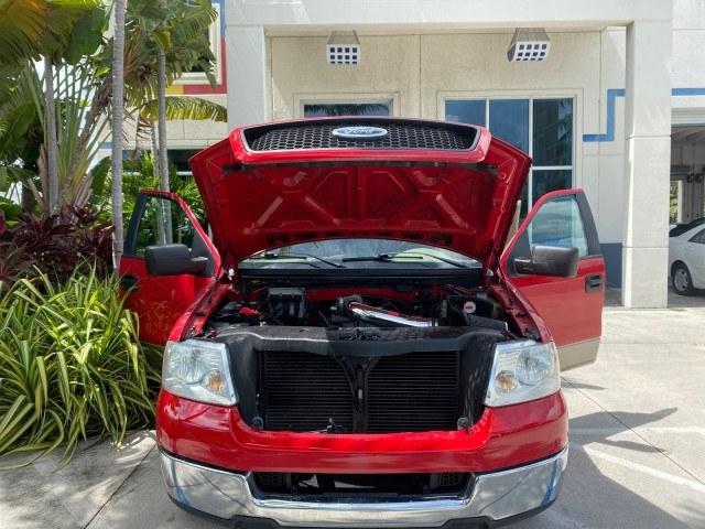 2005 Bright Red /Tan Ford F-150 XLT LOW MILES 78,118 (1FTRF12W25N) with an 4.6L EFI V8 Engine engine, Automatic transmission, located at 4701 North Dixie Hwy, Pompano Beach, FL, 33064, (954) 422-2889, 26.240938, -80.123474 - OUR WEBPAGE FLORIDACARS1.COM HAS OVER 100 PHOTOS AND FREE CARFAX LINK 2005 Ford F-150 XLT Pickup 4.6L V8 F SOHC Gasoline 19 MPG Rear Wheel Drive Features ABS Brakes Air Conditioning AM/FM Stereo Automatic Transmission Bed Cover Bed Liner CD Audio Cloth Seats Cruise Control Long Bed Power Locks Power- Photo#16