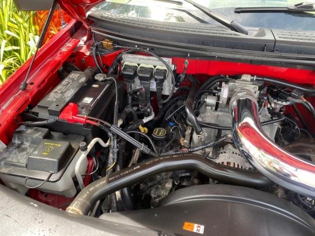 2005 Bright Red /Tan Ford F-150 XLT LOW MILES 78,118 (1FTRF12W25N) with an 4.6L EFI V8 Engine engine, Automatic transmission, located at 4701 North Dixie Hwy, Pompano Beach, FL, 33064, (954) 422-2889, 26.240938, -80.123474 - OUR WEBPAGE FLORIDACARS1.COM HAS OVER 100 PHOTOS AND FREE CARFAX LINK 2005 Ford F-150 XLT Pickup 4.6L V8 F SOHC Gasoline 19 MPG Rear Wheel Drive Features ABS Brakes Air Conditioning AM/FM Stereo Automatic Transmission Bed Cover Bed Liner CD Audio Cloth Seats Cruise Control Long Bed Power Locks Power- Photo#24