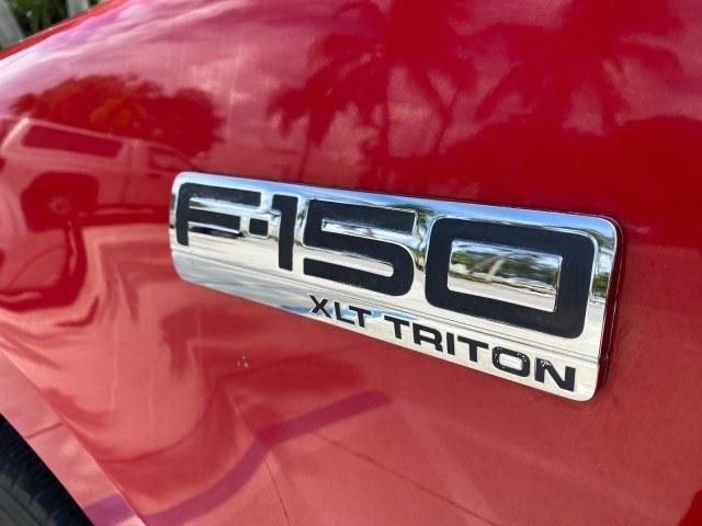 2005 Bright Red /Tan Ford F-150 XLT LOW MILES 78,118 (1FTRF12W25N) with an 4.6L EFI V8 Engine engine, Automatic transmission, located at 4701 North Dixie Hwy, Pompano Beach, FL, 33064, (954) 422-2889, 26.240938, -80.123474 - OUR WEBPAGE FLORIDACARS1.COM HAS OVER 100 PHOTOS AND FREE CARFAX LINK 2005 Ford F-150 XLT Pickup 4.6L V8 F SOHC Gasoline 19 MPG Rear Wheel Drive Features ABS Brakes Air Conditioning AM/FM Stereo Automatic Transmission Bed Cover Bed Liner CD Audio Cloth Seats Cruise Control Long Bed Power Locks Power- Photo#38