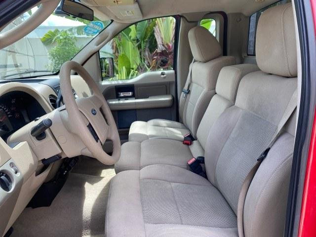 2005 Bright Red /Tan Ford F-150 XLT LOW MILES 78,118 (1FTRF12W25N) with an 4.6L EFI V8 Engine engine, Automatic transmission, located at 4701 North Dixie Hwy, Pompano Beach, FL, 33064, (954) 422-2889, 26.240938, -80.123474 - OUR WEBPAGE FLORIDACARS1.COM HAS OVER 100 PHOTOS AND FREE CARFAX LINK 2005 Ford F-150 XLT Pickup 4.6L V8 F SOHC Gasoline 19 MPG Rear Wheel Drive Features ABS Brakes Air Conditioning AM/FM Stereo Automatic Transmission Bed Cover Bed Liner CD Audio Cloth Seats Cruise Control Long Bed Power Locks Power- Photo#42