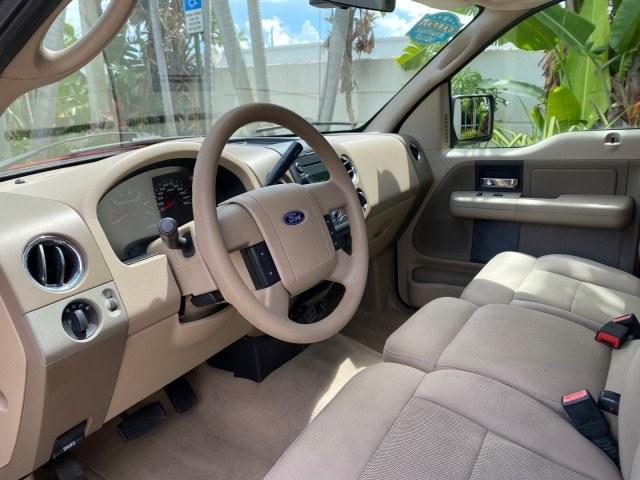 2005 Bright Red /Tan Ford F-150 XLT LOW MILES 78,118 (1FTRF12W25N) with an 4.6L EFI V8 Engine engine, Automatic transmission, located at 4701 North Dixie Hwy, Pompano Beach, FL, 33064, (954) 422-2889, 26.240938, -80.123474 - OUR WEBPAGE FLORIDACARS1.COM HAS OVER 100 PHOTOS AND FREE CARFAX LINK 2005 Ford F-150 XLT Pickup 4.6L V8 F SOHC Gasoline 19 MPG Rear Wheel Drive Features ABS Brakes Air Conditioning AM/FM Stereo Automatic Transmission Bed Cover Bed Liner CD Audio Cloth Seats Cruise Control Long Bed Power Locks Power- Photo#44