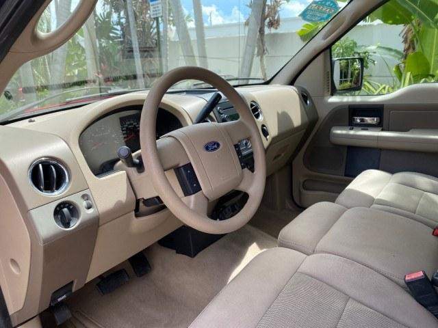 2005 Bright Red /Tan Ford F-150 XLT LOW MILES 78,118 (1FTRF12W25N) with an 4.6L EFI V8 Engine engine, Automatic transmission, located at 4701 North Dixie Hwy, Pompano Beach, FL, 33064, (954) 422-2889, 26.240938, -80.123474 - OUR WEBPAGE FLORIDACARS1.COM HAS OVER 100 PHOTOS AND FREE CARFAX LINK 2005 Ford F-150 XLT Pickup 4.6L V8 F SOHC Gasoline 19 MPG Rear Wheel Drive Features ABS Brakes Air Conditioning AM/FM Stereo Automatic Transmission Bed Cover Bed Liner CD Audio Cloth Seats Cruise Control Long Bed Power Locks Power- Photo#45