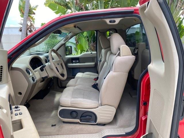2005 Bright Red /Tan Ford F-150 XLT LOW MILES 78,118 (1FTRF12W25N) with an 4.6L EFI V8 Engine engine, Automatic transmission, located at 4701 North Dixie Hwy, Pompano Beach, FL, 33064, (954) 422-2889, 26.240938, -80.123474 - OUR WEBPAGE FLORIDACARS1.COM HAS OVER 100 PHOTOS AND FREE CARFAX LINK 2005 Ford F-150 XLT Pickup 4.6L V8 F SOHC Gasoline 19 MPG Rear Wheel Drive Features ABS Brakes Air Conditioning AM/FM Stereo Automatic Transmission Bed Cover Bed Liner CD Audio Cloth Seats Cruise Control Long Bed Power Locks Power- Photo#65