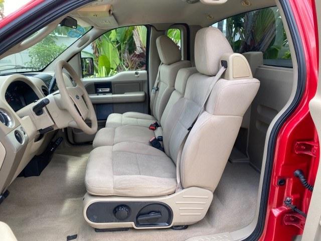 2005 Bright Red /Tan Ford F-150 XLT LOW MILES 78,118 (1FTRF12W25N) with an 4.6L EFI V8 Engine engine, Automatic transmission, located at 4701 North Dixie Hwy, Pompano Beach, FL, 33064, (954) 422-2889, 26.240938, -80.123474 - OUR WEBPAGE FLORIDACARS1.COM HAS OVER 100 PHOTOS AND FREE CARFAX LINK 2005 Ford F-150 XLT Pickup 4.6L V8 F SOHC Gasoline 19 MPG Rear Wheel Drive Features ABS Brakes Air Conditioning AM/FM Stereo Automatic Transmission Bed Cover Bed Liner CD Audio Cloth Seats Cruise Control Long Bed Power Locks Power- Photo#66