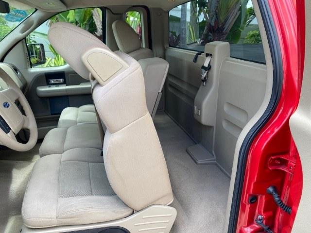 2005 Bright Red /Tan Ford F-150 XLT LOW MILES 78,118 (1FTRF12W25N) with an 4.6L EFI V8 Engine engine, Automatic transmission, located at 4701 North Dixie Hwy, Pompano Beach, FL, 33064, (954) 422-2889, 26.240938, -80.123474 - OUR WEBPAGE FLORIDACARS1.COM HAS OVER 100 PHOTOS AND FREE CARFAX LINK 2005 Ford F-150 XLT Pickup 4.6L V8 F SOHC Gasoline 19 MPG Rear Wheel Drive Features ABS Brakes Air Conditioning AM/FM Stereo Automatic Transmission Bed Cover Bed Liner CD Audio Cloth Seats Cruise Control Long Bed Power Locks Power- Photo#68