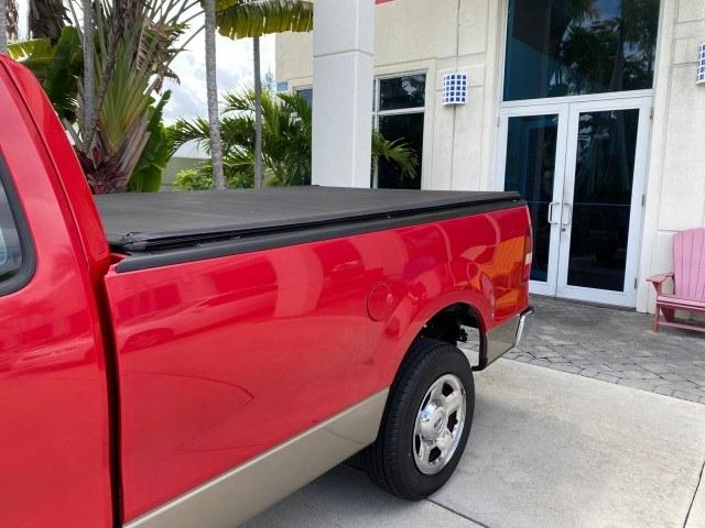 2005 Bright Red /Tan Ford F-150 XLT LOW MILES 78,118 (1FTRF12W25N) with an 4.6L EFI V8 Engine engine, Automatic transmission, located at 4701 North Dixie Hwy, Pompano Beach, FL, 33064, (954) 422-2889, 26.240938, -80.123474 - OUR WEBPAGE FLORIDACARS1.COM HAS OVER 100 PHOTOS AND FREE CARFAX LINK 2005 Ford F-150 XLT Pickup 4.6L V8 F SOHC Gasoline 19 MPG Rear Wheel Drive Features ABS Brakes Air Conditioning AM/FM Stereo Automatic Transmission Bed Cover Bed Liner CD Audio Cloth Seats Cruise Control Long Bed Power Locks Power- Photo#70