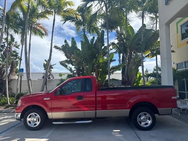 2005 Bright Red /Tan Ford F-150 XLT LOW MILES 78,118 (1FTRF12W25N) with an 4.6L EFI V8 Engine engine, Automatic transmission, located at 4701 North Dixie Hwy, Pompano Beach, FL, 33064, (954) 422-2889, 26.240938, -80.123474 - OUR WEBPAGE FLORIDACARS1.COM HAS OVER 100 PHOTOS AND FREE CARFAX LINK 2005 Ford F-150 XLT Pickup 4.6L V8 F SOHC Gasoline 19 MPG Rear Wheel Drive Features ABS Brakes Air Conditioning AM/FM Stereo Automatic Transmission Bed Cover Bed Liner CD Audio Cloth Seats Cruise Control Long Bed Power Locks Power- Photo#30