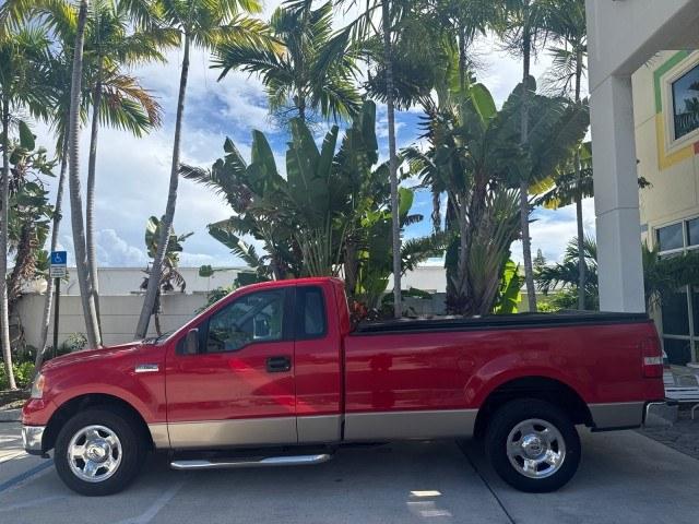 2005 Bright Red /Tan Ford F-150 XLT LOW MILES 78,118 (1FTRF12W25N) with an 4.6L EFI V8 Engine engine, Automatic transmission, located at 4701 North Dixie Hwy, Pompano Beach, FL, 33064, (954) 422-2889, 26.240938, -80.123474 - OUR WEBPAGE FLORIDACARS1.COM HAS OVER 100 PHOTOS AND FREE CARFAX LINK 2005 Ford F-150 XLT Pickup 4.6L V8 F SOHC Gasoline 19 MPG Rear Wheel Drive Features ABS Brakes Air Conditioning AM/FM Stereo Automatic Transmission Bed Cover Bed Liner CD Audio Cloth Seats Cruise Control Long Bed Power Locks Power- Photo#31