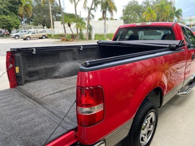 2005 Bright Red /Tan Ford F-150 XLT LOW MILES 78,118 (1FTRF12W25N) with an 4.6L EFI V8 Engine engine, Automatic transmission, located at 4701 North Dixie Hwy, Pompano Beach, FL, 33064, (954) 422-2889, 26.240938, -80.123474 - OUR WEBPAGE FLORIDACARS1.COM HAS OVER 100 PHOTOS AND FREE CARFAX LINK 2005 Ford F-150 XLT Pickup 4.6L V8 F SOHC Gasoline 19 MPG Rear Wheel Drive Features ABS Brakes Air Conditioning AM/FM Stereo Automatic Transmission Bed Cover Bed Liner CD Audio Cloth Seats Cruise Control Long Bed Power Locks Power- Photo#98