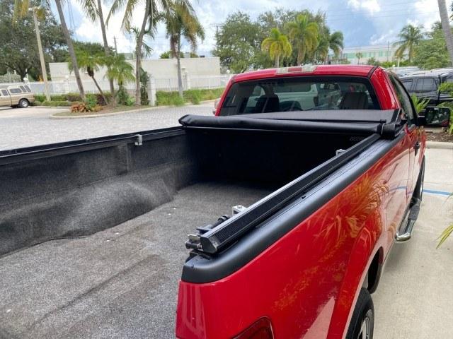 2005 Bright Red /Tan Ford F-150 XLT LOW MILES 78,118 (1FTRF12W25N) with an 4.6L EFI V8 Engine engine, Automatic transmission, located at 4701 North Dixie Hwy, Pompano Beach, FL, 33064, (954) 422-2889, 26.240938, -80.123474 - OUR WEBPAGE FLORIDACARS1.COM HAS OVER 100 PHOTOS AND FREE CARFAX LINK 2005 Ford F-150 XLT Pickup 4.6L V8 F SOHC Gasoline 19 MPG Rear Wheel Drive Features ABS Brakes Air Conditioning AM/FM Stereo Automatic Transmission Bed Cover Bed Liner CD Audio Cloth Seats Cruise Control Long Bed Power Locks Power- Photo#99