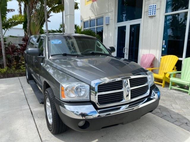 2005 Mineral Gray Metallic /Med Slate Gray Dodge Dakota SLT LOW MILES 70,362 4WD (1D7HW42K55S) with an 3.7L V6 Magnum Engine engine, Automatic transmission, located at 4701 North Dixie Hwy, Pompano Beach, FL, 33064, (954) 422-2889, 26.240938, -80.123474 - OUR WEBPAGE FLORIDACARS1.COM HAS OVER 100 PHOTOS AND FREE CARFAX LINK 2005 Dodge Dakota SLT Club Cab Pickup 3.7L V6 F Gasoline 20 MPG Rear Wheel Drive w/ 4X4 Features 4WD/AWD ABS Brakes Air Conditioning Alloy Wheels AM/FM Stereo Automatic Transmission Bed Cover Bed Liner CD Audio Cloth Seats Cruise- Photo#1