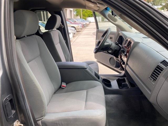 2005 Mineral Gray Metallic /Med Slate Gray Dodge Dakota SLT LOW MILES 70,362 4WD (1D7HW42K55S) with an 3.7L V6 Magnum Engine engine, Automatic transmission, located at 4701 North Dixie Hwy, Pompano Beach, FL, 33064, (954) 422-2889, 26.240938, -80.123474 - OUR WEBPAGE FLORIDACARS1.COM HAS OVER 100 PHOTOS AND FREE CARFAX LINK 2005 Dodge Dakota SLT Club Cab Pickup 3.7L V6 F Gasoline 20 MPG Rear Wheel Drive w/ 4X4 Features 4WD/AWD ABS Brakes Air Conditioning Alloy Wheels AM/FM Stereo Automatic Transmission Bed Cover Bed Liner CD Audio Cloth Seats Cruise- Photo#12