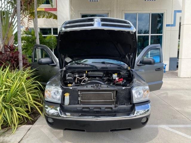 2005 Mineral Gray Metallic /Med Slate Gray Dodge Dakota SLT LOW MILES 70,362 4WD (1D7HW42K55S) with an 3.7L V6 Magnum Engine engine, Automatic transmission, located at 4701 North Dixie Hwy, Pompano Beach, FL, 33064, (954) 422-2889, 26.240938, -80.123474 - OUR WEBPAGE FLORIDACARS1.COM HAS OVER 100 PHOTOS AND FREE CARFAX LINK 2005 Dodge Dakota SLT Club Cab Pickup 3.7L V6 F Gasoline 20 MPG Rear Wheel Drive w/ 4X4 Features 4WD/AWD ABS Brakes Air Conditioning Alloy Wheels AM/FM Stereo Automatic Transmission Bed Cover Bed Liner CD Audio Cloth Seats Cruise- Photo#16
