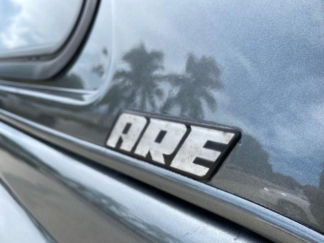 2005 Mineral Gray Metallic /Med Slate Gray Dodge Dakota SLT LOW MILES 70,362 4WD (1D7HW42K55S) with an 3.7L V6 Magnum Engine engine, Automatic transmission, located at 4701 North Dixie Hwy, Pompano Beach, FL, 33064, (954) 422-2889, 26.240938, -80.123474 - OUR WEBPAGE FLORIDACARS1.COM HAS OVER 100 PHOTOS AND FREE CARFAX LINK 2005 Dodge Dakota SLT Club Cab Pickup 3.7L V6 F Gasoline 20 MPG Rear Wheel Drive w/ 4X4 Features 4WD/AWD ABS Brakes Air Conditioning Alloy Wheels AM/FM Stereo Automatic Transmission Bed Cover Bed Liner CD Audio Cloth Seats Cruise- Photo#91