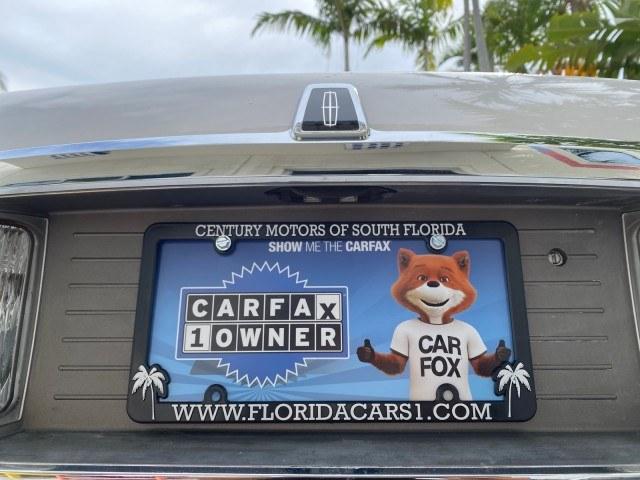 2010 Vibrant White /Light Camel Lincoln Town Car Signature Limited LOW MILES 47,515 (2LNBL8CV3AX) with an 4.6L SOHC EFI V8 FFV Engine engine, Automatic transmission, located at 4701 North Dixie Hwy, Pompano Beach, FL, 33064, (954) 422-2889, 26.240938, -80.123474 - OUR WEBPAGE FLORIDACARS1.COM HAS OVER 100 PHOTOS AND FREE CARFAX LINK 2010 Lincoln Town Car Signature Limited Sedan 4 DR 4.6L V8 F SOHC 16V Flex Fuel 24 MPG Rear Wheel Drive Features ABS Brakes Air Conditioning Alloy Wheels AM/FM Stereo Automatic Transmission CD Audio Cruise Control Flex Fuel Vehicl- Photo#95