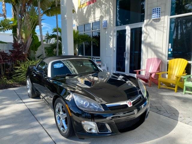2009 Black Onyx /Black Saturn Sky Red Line TURBO LOW MILES 56,207 (1G8MT35X09Y) with an Turbocharged And Intercooled Ecotec 2.0L VVT DOHC 4-Cyl Aluminum Engine engine, Automatic transmission, located at 4701 North Dixie Hwy, Pompano Beach, FL, 33064, (954) 422-2889, 26.240938, -80.123474 - OUR WEBPAGE FLORIDACARS1.COM HAS OVER 100 PHOTOS AND FREE CARFAX LINK 2009 Saturn SKY Red Line Convertible 2.0L I4 F DOHC 16V Gasoline 31 MPG Rear Wheel Drive Features ABS Brakes Air Conditioning Alloy Wheels AM/FM Stereo Automatic Transmission CD Audio Leather Seats Cruise Control Power Locks Power- Photo#1