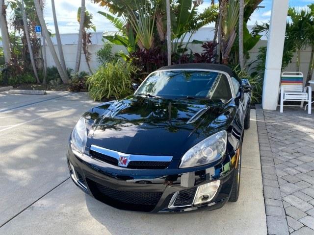 2009 Black Onyx /Black Saturn Sky Red Line TURBO LOW MILES 56,207 (1G8MT35X09Y) with an Turbocharged And Intercooled Ecotec 2.0L VVT DOHC 4-Cyl Aluminum Engine engine, Automatic transmission, located at 4701 North Dixie Hwy, Pompano Beach, FL, 33064, (954) 422-2889, 26.240938, -80.123474 - OUR WEBPAGE FLORIDACARS1.COM HAS OVER 100 PHOTOS AND FREE CARFAX LINK 2009 Saturn SKY Red Line Convertible 2.0L I4 F DOHC 16V Gasoline 31 MPG Rear Wheel Drive Features ABS Brakes Air Conditioning Alloy Wheels AM/FM Stereo Automatic Transmission CD Audio Leather Seats Cruise Control Power Locks Power- Photo#3