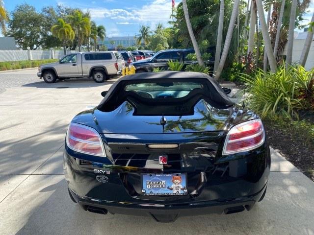 2009 Black Onyx /Black Saturn Sky Red Line TURBO LOW MILES 56,207 (1G8MT35X09Y) with an Turbocharged And Intercooled Ecotec 2.0L VVT DOHC 4-Cyl Aluminum Engine engine, Automatic transmission, located at 4701 North Dixie Hwy, Pompano Beach, FL, 33064, (954) 422-2889, 26.240938, -80.123474 - OUR WEBPAGE FLORIDACARS1.COM HAS OVER 100 PHOTOS AND FREE CARFAX LINK 2009 Saturn SKY Red Line Convertible 2.0L I4 F DOHC 16V Gasoline 31 MPG Rear Wheel Drive Features ABS Brakes Air Conditioning Alloy Wheels AM/FM Stereo Automatic Transmission CD Audio Leather Seats Cruise Control Power Locks Power- Photo#6