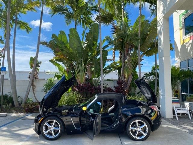 2009 Black Onyx /Black Saturn Sky Red Line TURBO LOW MILES 56,207 (1G8MT35X09Y) with an Turbocharged And Intercooled Ecotec 2.0L VVT DOHC 4-Cyl Aluminum Engine engine, Automatic transmission, located at 4701 North Dixie Hwy, Pompano Beach, FL, 33064, (954) 422-2889, 26.240938, -80.123474 - OUR WEBPAGE FLORIDACARS1.COM HAS OVER 100 PHOTOS AND FREE CARFAX LINK 2009 Saturn SKY Red Line Convertible 2.0L I4 F DOHC 16V Gasoline 31 MPG Rear Wheel Drive Features ABS Brakes Air Conditioning Alloy Wheels AM/FM Stereo Automatic Transmission CD Audio Leather Seats Cruise Control Power Locks Power- Photo#8