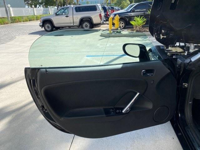 2009 Black Onyx /Black Saturn Sky Red Line TURBO LOW MILES 56,207 (1G8MT35X09Y) with an Turbocharged And Intercooled Ecotec 2.0L VVT DOHC 4-Cyl Aluminum Engine engine, Automatic transmission, located at 4701 North Dixie Hwy, Pompano Beach, FL, 33064, (954) 422-2889, 26.240938, -80.123474 - OUR WEBPAGE FLORIDACARS1.COM HAS OVER 100 PHOTOS AND FREE CARFAX LINK 2009 Saturn SKY Red Line Convertible 2.0L I4 F DOHC 16V Gasoline 31 MPG Rear Wheel Drive Features ABS Brakes Air Conditioning Alloy Wheels AM/FM Stereo Automatic Transmission CD Audio Leather Seats Cruise Control Power Locks Power- Photo#9