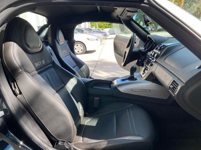 2009 Black Onyx /Black Saturn Sky Red Line TURBO LOW MILES 56,207 (1G8MT35X09Y) with an Turbocharged And Intercooled Ecotec 2.0L VVT DOHC 4-Cyl Aluminum Engine engine, Automatic transmission, located at 4701 North Dixie Hwy, Pompano Beach, FL, 33064, (954) 422-2889, 26.240938, -80.123474 - OUR WEBPAGE FLORIDACARS1.COM HAS OVER 100 PHOTOS AND FREE CARFAX LINK 2009 Saturn SKY Red Line Convertible 2.0L I4 F DOHC 16V Gasoline 31 MPG Rear Wheel Drive Features ABS Brakes Air Conditioning Alloy Wheels AM/FM Stereo Automatic Transmission CD Audio Leather Seats Cruise Control Power Locks Power- Photo#12