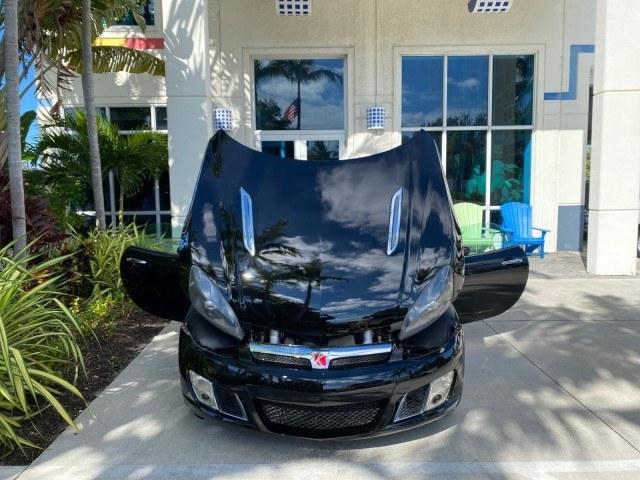 2009 Black Onyx /Black Saturn Sky Red Line TURBO LOW MILES 56,207 (1G8MT35X09Y) with an Turbocharged And Intercooled Ecotec 2.0L VVT DOHC 4-Cyl Aluminum Engine engine, Automatic transmission, located at 4701 North Dixie Hwy, Pompano Beach, FL, 33064, (954) 422-2889, 26.240938, -80.123474 - OUR WEBPAGE FLORIDACARS1.COM HAS OVER 100 PHOTOS AND FREE CARFAX LINK 2009 Saturn SKY Red Line Convertible 2.0L I4 F DOHC 16V Gasoline 31 MPG Rear Wheel Drive Features ABS Brakes Air Conditioning Alloy Wheels AM/FM Stereo Automatic Transmission CD Audio Leather Seats Cruise Control Power Locks Power- Photo#16