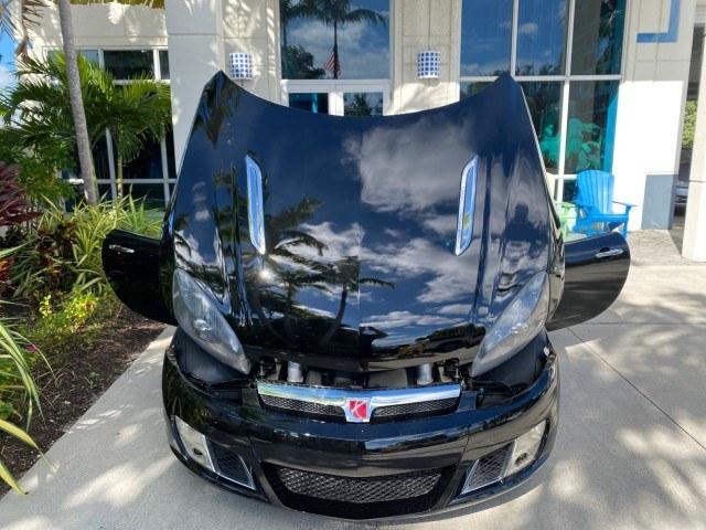 2009 Black Onyx /Black Saturn Sky Red Line TURBO LOW MILES 56,207 (1G8MT35X09Y) with an Turbocharged And Intercooled Ecotec 2.0L VVT DOHC 4-Cyl Aluminum Engine engine, Automatic transmission, located at 4701 North Dixie Hwy, Pompano Beach, FL, 33064, (954) 422-2889, 26.240938, -80.123474 - OUR WEBPAGE FLORIDACARS1.COM HAS OVER 100 PHOTOS AND FREE CARFAX LINK 2009 Saturn SKY Red Line Convertible 2.0L I4 F DOHC 16V Gasoline 31 MPG Rear Wheel Drive Features ABS Brakes Air Conditioning Alloy Wheels AM/FM Stereo Automatic Transmission CD Audio Leather Seats Cruise Control Power Locks Power- Photo#17
