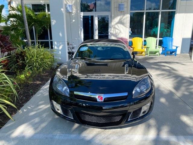 2009 Black Onyx /Black Saturn Sky Red Line TURBO LOW MILES 56,207 (1G8MT35X09Y) with an Turbocharged And Intercooled Ecotec 2.0L VVT DOHC 4-Cyl Aluminum Engine engine, Automatic transmission, located at 4701 North Dixie Hwy, Pompano Beach, FL, 33064, (954) 422-2889, 26.240938, -80.123474 - OUR WEBPAGE FLORIDACARS1.COM HAS OVER 100 PHOTOS AND FREE CARFAX LINK 2009 Saturn SKY Red Line Convertible 2.0L I4 F DOHC 16V Gasoline 31 MPG Rear Wheel Drive Features ABS Brakes Air Conditioning Alloy Wheels AM/FM Stereo Automatic Transmission CD Audio Leather Seats Cruise Control Power Locks Power- Photo#26