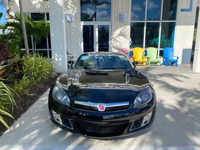 2009 Black Onyx /Black Saturn Sky Red Line TURBO LOW MILES 56,207 (1G8MT35X09Y) with an Turbocharged And Intercooled Ecotec 2.0L VVT DOHC 4-Cyl Aluminum Engine engine, Automatic transmission, located at 4701 North Dixie Hwy, Pompano Beach, FL, 33064, (954) 422-2889, 26.240938, -80.123474 - OUR WEBPAGE FLORIDACARS1.COM HAS OVER 100 PHOTOS AND FREE CARFAX LINK 2009 Saturn SKY Red Line Convertible 2.0L I4 F DOHC 16V Gasoline 31 MPG Rear Wheel Drive Features ABS Brakes Air Conditioning Alloy Wheels AM/FM Stereo Automatic Transmission CD Audio Leather Seats Cruise Control Power Locks Power- Photo#27