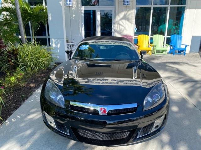 2009 Black Onyx /Black Saturn Sky Red Line TURBO LOW MILES 56,207 (1G8MT35X09Y) with an Turbocharged And Intercooled Ecotec 2.0L VVT DOHC 4-Cyl Aluminum Engine engine, Automatic transmission, located at 4701 North Dixie Hwy, Pompano Beach, FL, 33064, (954) 422-2889, 26.240938, -80.123474 - OUR WEBPAGE FLORIDACARS1.COM HAS OVER 100 PHOTOS AND FREE CARFAX LINK 2009 Saturn SKY Red Line Convertible 2.0L I4 F DOHC 16V Gasoline 31 MPG Rear Wheel Drive Features ABS Brakes Air Conditioning Alloy Wheels AM/FM Stereo Automatic Transmission CD Audio Leather Seats Cruise Control Power Locks Power- Photo#28