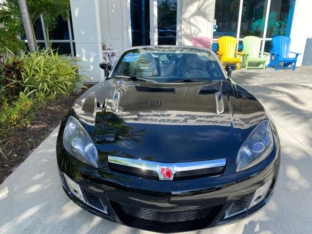 2009 Black Onyx /Black Saturn Sky Red Line TURBO LOW MILES 56,207 (1G8MT35X09Y) with an Turbocharged And Intercooled Ecotec 2.0L VVT DOHC 4-Cyl Aluminum Engine engine, Automatic transmission, located at 4701 North Dixie Hwy, Pompano Beach, FL, 33064, (954) 422-2889, 26.240938, -80.123474 - OUR WEBPAGE FLORIDACARS1.COM HAS OVER 100 PHOTOS AND FREE CARFAX LINK 2009 Saturn SKY Red Line Convertible 2.0L I4 F DOHC 16V Gasoline 31 MPG Rear Wheel Drive Features ABS Brakes Air Conditioning Alloy Wheels AM/FM Stereo Automatic Transmission CD Audio Leather Seats Cruise Control Power Locks Power- Photo#29