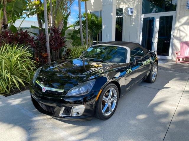 2009 Black Onyx /Black Saturn Sky Red Line TURBO LOW MILES 56,207 (1G8MT35X09Y) with an Turbocharged And Intercooled Ecotec 2.0L VVT DOHC 4-Cyl Aluminum Engine engine, Automatic transmission, located at 4701 North Dixie Hwy, Pompano Beach, FL, 33064, (954) 422-2889, 26.240938, -80.123474 - OUR WEBPAGE FLORIDACARS1.COM HAS OVER 100 PHOTOS AND FREE CARFAX LINK 2009 Saturn SKY Red Line Convertible 2.0L I4 F DOHC 16V Gasoline 31 MPG Rear Wheel Drive Features ABS Brakes Air Conditioning Alloy Wheels AM/FM Stereo Automatic Transmission CD Audio Leather Seats Cruise Control Power Locks Power- Photo#30