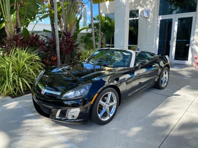 2009 Black Onyx /Black Saturn Sky Red Line TURBO LOW MILES 56,207 (1G8MT35X09Y) with an Turbocharged And Intercooled Ecotec 2.0L VVT DOHC 4-Cyl Aluminum Engine engine, Automatic transmission, located at 4701 North Dixie Hwy, Pompano Beach, FL, 33064, (954) 422-2889, 26.240938, -80.123474 - OUR WEBPAGE FLORIDACARS1.COM HAS OVER 100 PHOTOS AND FREE CARFAX LINK 2009 Saturn SKY Red Line Convertible 2.0L I4 F DOHC 16V Gasoline 31 MPG Rear Wheel Drive Features ABS Brakes Air Conditioning Alloy Wheels AM/FM Stereo Automatic Transmission CD Audio Leather Seats Cruise Control Power Locks Power- Photo#31