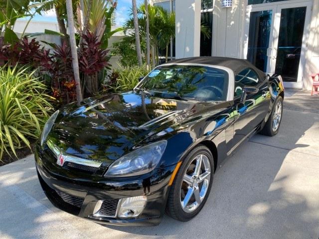 2009 Black Onyx /Black Saturn Sky Red Line TURBO LOW MILES 56,207 (1G8MT35X09Y) with an Turbocharged And Intercooled Ecotec 2.0L VVT DOHC 4-Cyl Aluminum Engine engine, Automatic transmission, located at 4701 North Dixie Hwy, Pompano Beach, FL, 33064, (954) 422-2889, 26.240938, -80.123474 - OUR WEBPAGE FLORIDACARS1.COM HAS OVER 100 PHOTOS AND FREE CARFAX LINK 2009 Saturn SKY Red Line Convertible 2.0L I4 F DOHC 16V Gasoline 31 MPG Rear Wheel Drive Features ABS Brakes Air Conditioning Alloy Wheels AM/FM Stereo Automatic Transmission CD Audio Leather Seats Cruise Control Power Locks Power- Photo#32