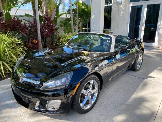 2009 Black Onyx /Black Saturn Sky Red Line TURBO LOW MILES 56,207 (1G8MT35X09Y) with an Turbocharged And Intercooled Ecotec 2.0L VVT DOHC 4-Cyl Aluminum Engine engine, Automatic transmission, located at 4701 North Dixie Hwy, Pompano Beach, FL, 33064, (954) 422-2889, 26.240938, -80.123474 - OUR WEBPAGE FLORIDACARS1.COM HAS OVER 100 PHOTOS AND FREE CARFAX LINK 2009 Saturn SKY Red Line Convertible 2.0L I4 F DOHC 16V Gasoline 31 MPG Rear Wheel Drive Features ABS Brakes Air Conditioning Alloy Wheels AM/FM Stereo Automatic Transmission CD Audio Leather Seats Cruise Control Power Locks Power- Photo#33