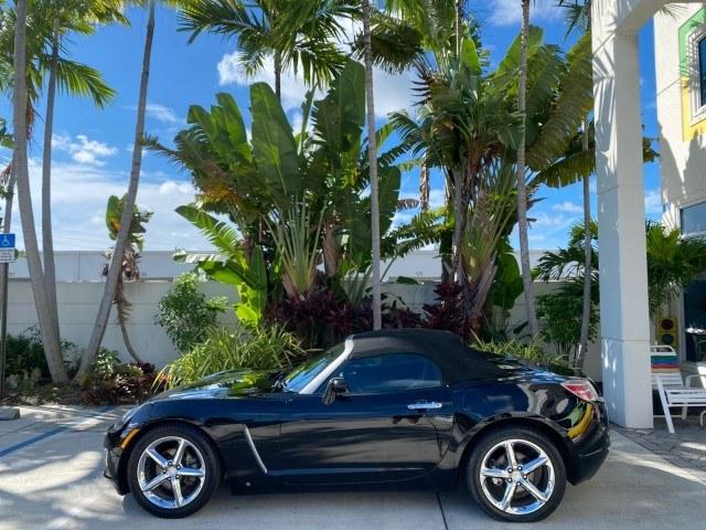 2009 Black Onyx /Black Saturn Sky Red Line TURBO LOW MILES 56,207 (1G8MT35X09Y) with an Turbocharged And Intercooled Ecotec 2.0L VVT DOHC 4-Cyl Aluminum Engine engine, Automatic transmission, located at 4701 North Dixie Hwy, Pompano Beach, FL, 33064, (954) 422-2889, 26.240938, -80.123474 - OUR WEBPAGE FLORIDACARS1.COM HAS OVER 100 PHOTOS AND FREE CARFAX LINK 2009 Saturn SKY Red Line Convertible 2.0L I4 F DOHC 16V Gasoline 31 MPG Rear Wheel Drive Features ABS Brakes Air Conditioning Alloy Wheels AM/FM Stereo Automatic Transmission CD Audio Leather Seats Cruise Control Power Locks Power- Photo#34