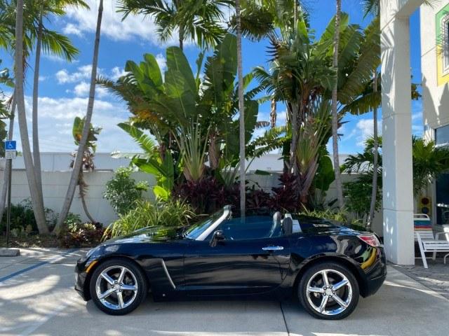 2009 Black Onyx /Black Saturn Sky Red Line TURBO LOW MILES 56,207 (1G8MT35X09Y) with an Turbocharged And Intercooled Ecotec 2.0L VVT DOHC 4-Cyl Aluminum Engine engine, Automatic transmission, located at 4701 North Dixie Hwy, Pompano Beach, FL, 33064, (954) 422-2889, 26.240938, -80.123474 - OUR WEBPAGE FLORIDACARS1.COM HAS OVER 100 PHOTOS AND FREE CARFAX LINK 2009 Saturn SKY Red Line Convertible 2.0L I4 F DOHC 16V Gasoline 31 MPG Rear Wheel Drive Features ABS Brakes Air Conditioning Alloy Wheels AM/FM Stereo Automatic Transmission CD Audio Leather Seats Cruise Control Power Locks Power- Photo#35